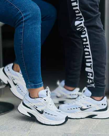Nike dama y caballero initiator